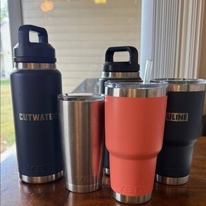 5 Yeti bottles. Assorted sizes and colors.